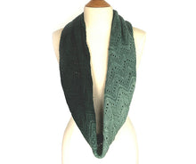 Load image into Gallery viewer, A graduated coloured lace knitted cowl in shades of green hanging on the neck of a cream dress mannequin on a white background. Pattern is Adventurer Cowl by Ambah O'Brien