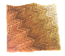 Load image into Gallery viewer, A multi coloured lace knitted cowl in shades of cream, coral and tan lying on a white background. Pattern is Adventurer Cowl by Ambah O'Brien