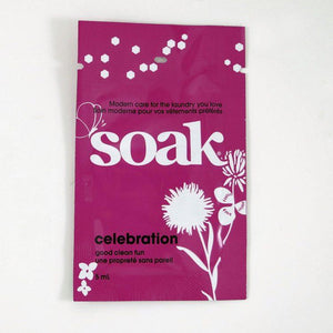One dark pink sachet of Soak rinse-free laundry liquid on a white background (Celebration scent)