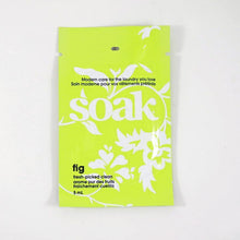Load image into Gallery viewer, One lime green sachet of Soak rinse-free laundry liquid on a white background (Fig scent)

